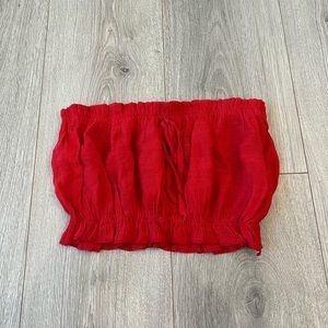 Red dainty tube top. Bow tie on front